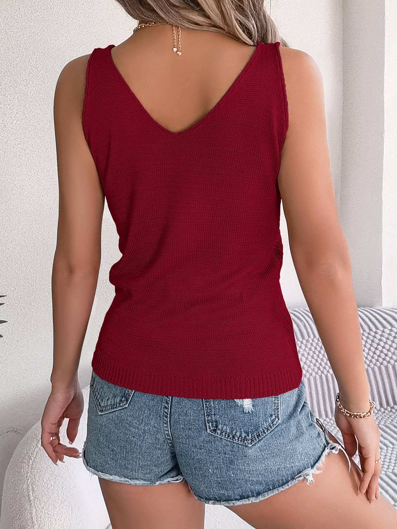V-neck cutout sleeveless knit vest