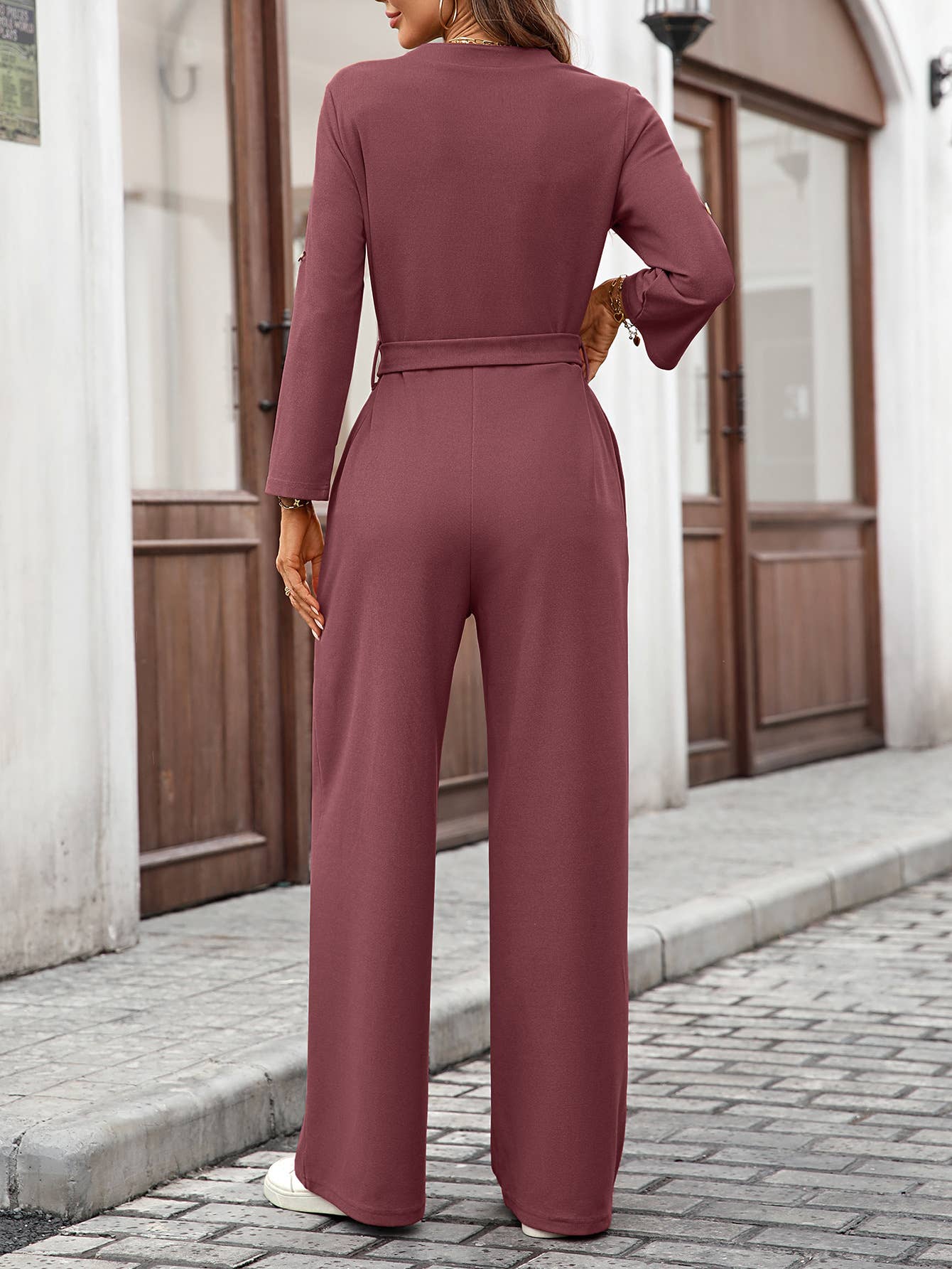 Solid-color high-waisted long-sleeved jumpsuit