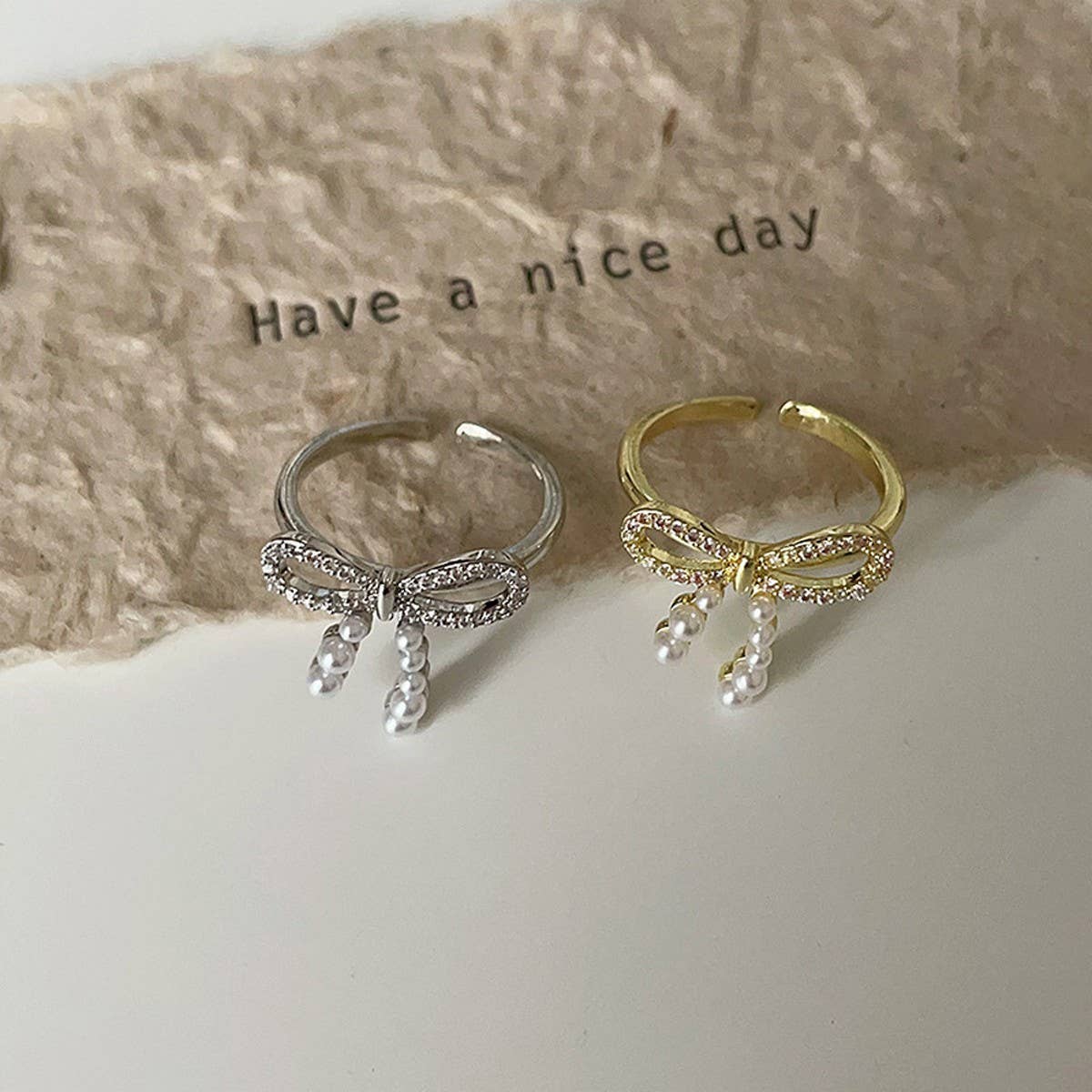 FASHIONABLE BOW SMALL PEARL RING FOR WOMEN_CWAJE3096