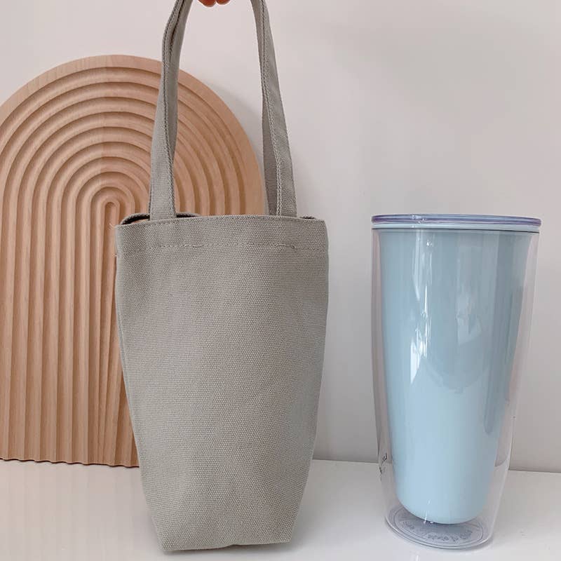 Portable and portable slanting water cup bag