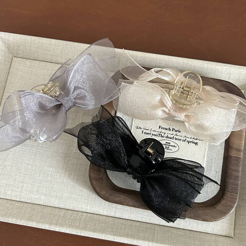 Fashionable and design-oriented mesh bow clipper