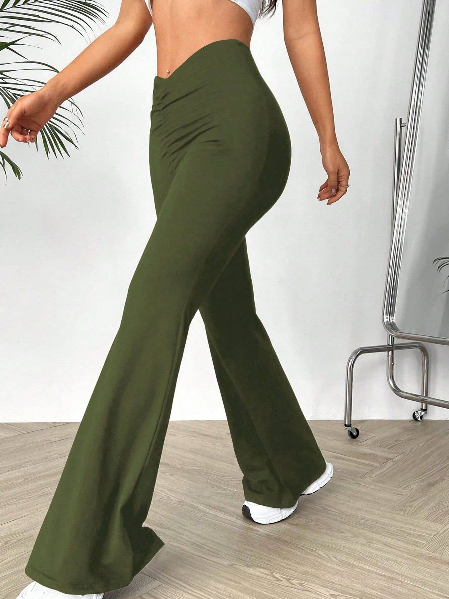V-shaped waist slimming slightly flared trousers