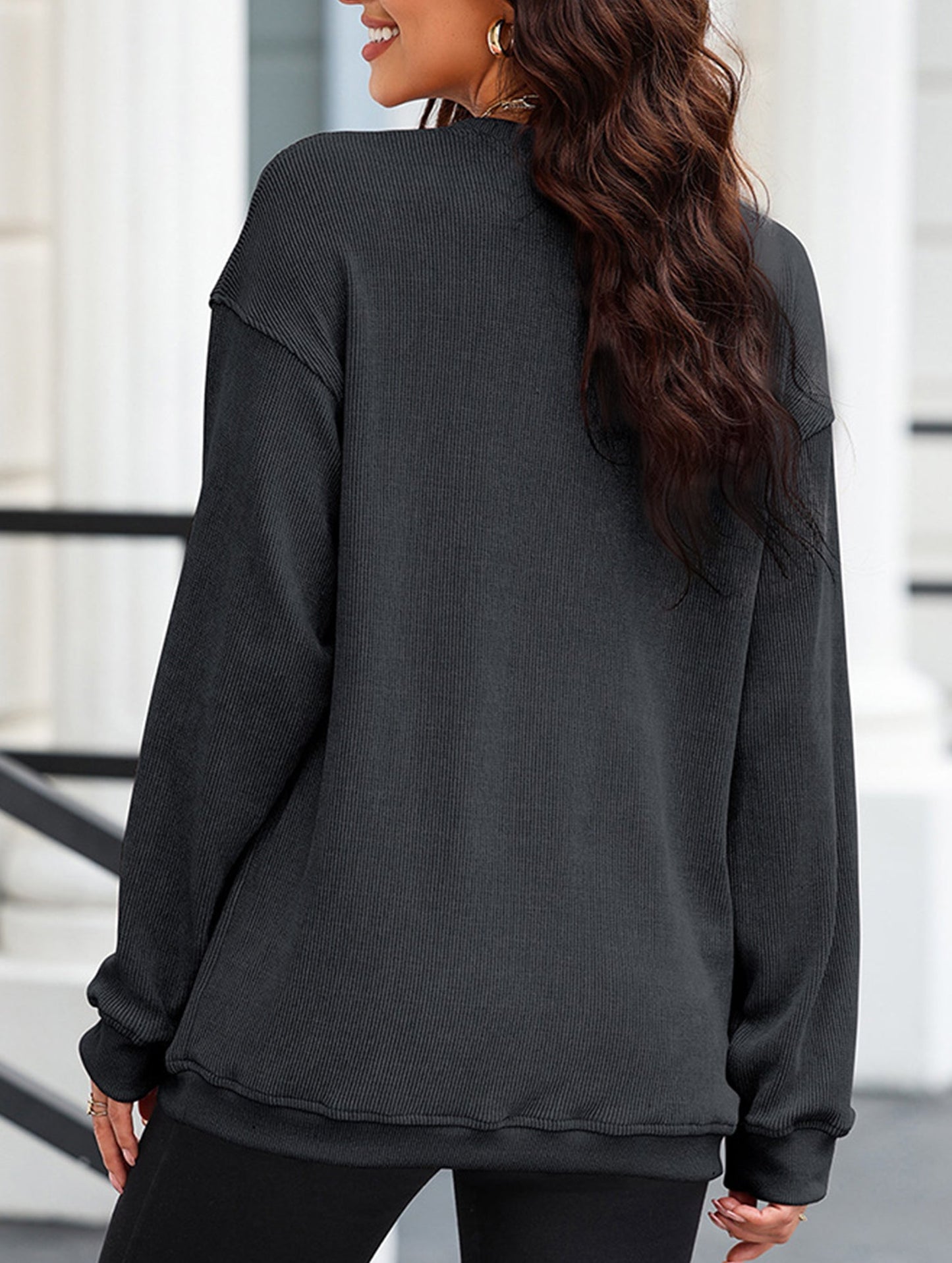 Long-sleeved ribbed sweater