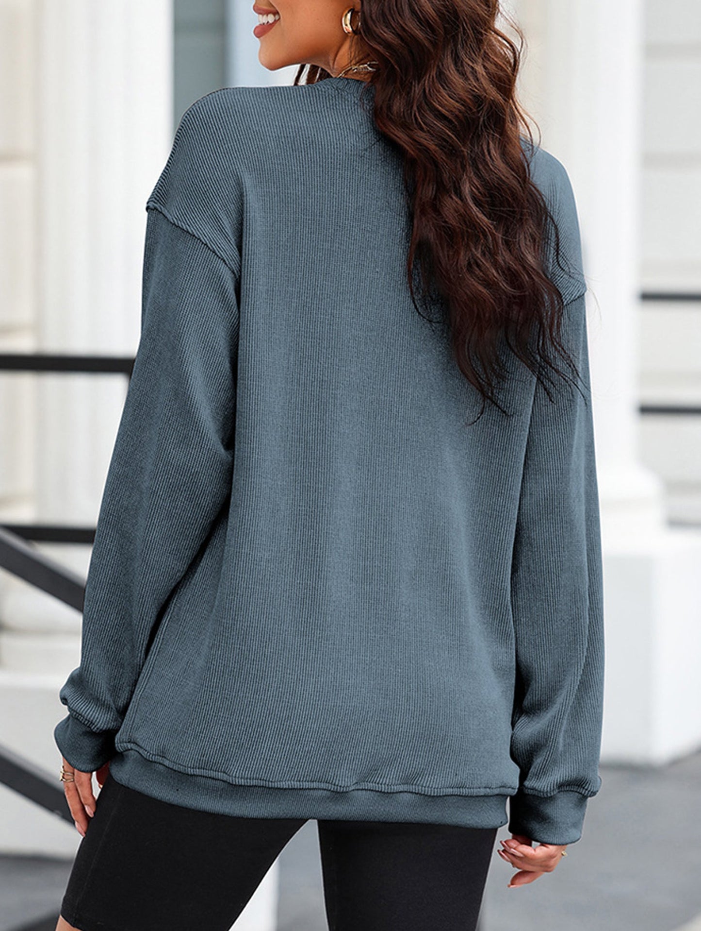 Long-sleeved ribbed sweater