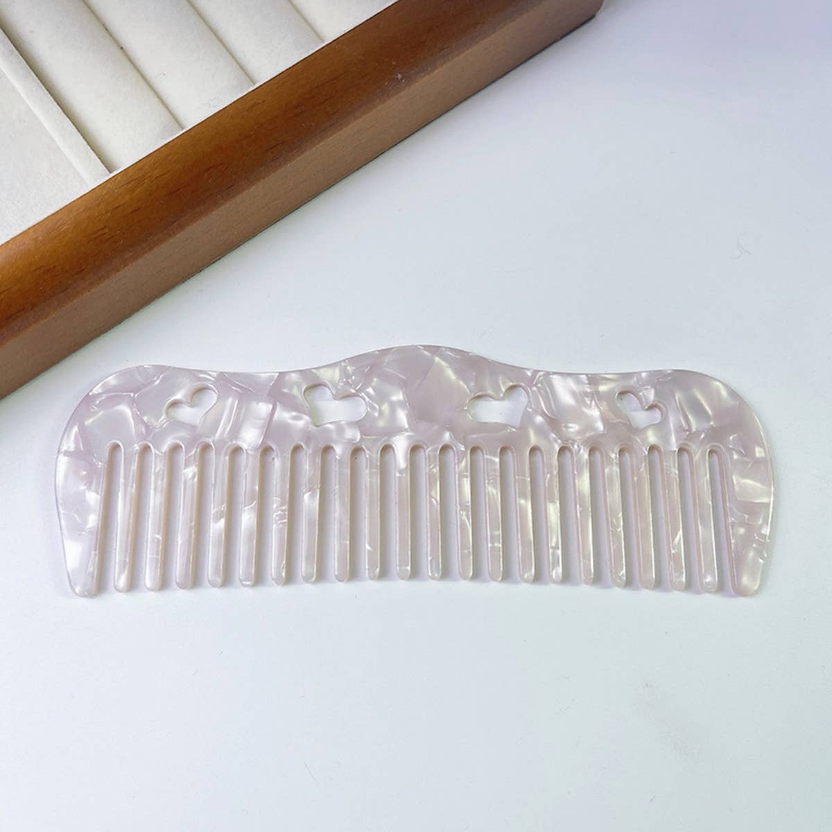 HOLLOW HEART PORTABLE MASSAGE COMB
