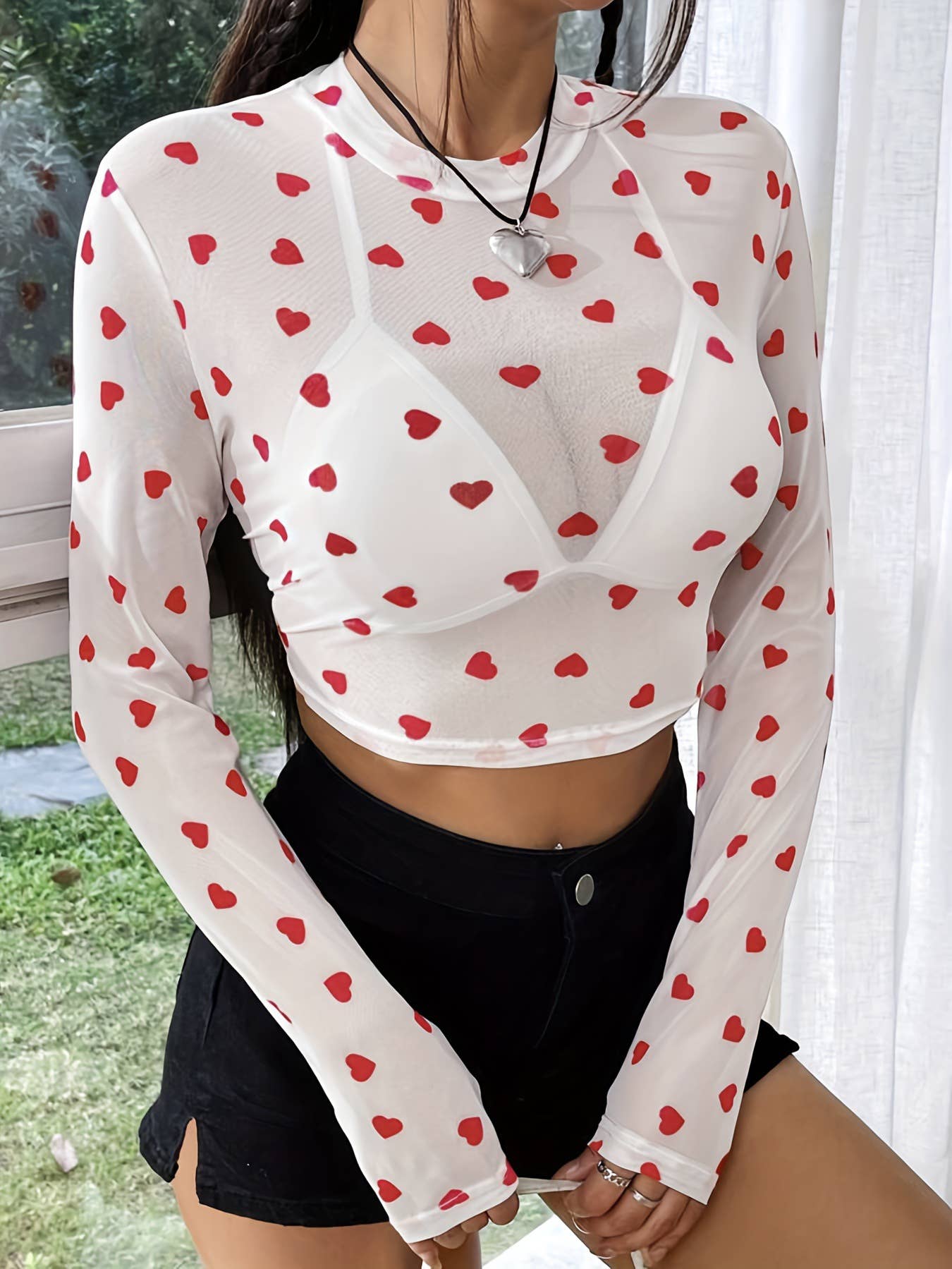 A mesh printed heart-shaped round-neck T-shirt