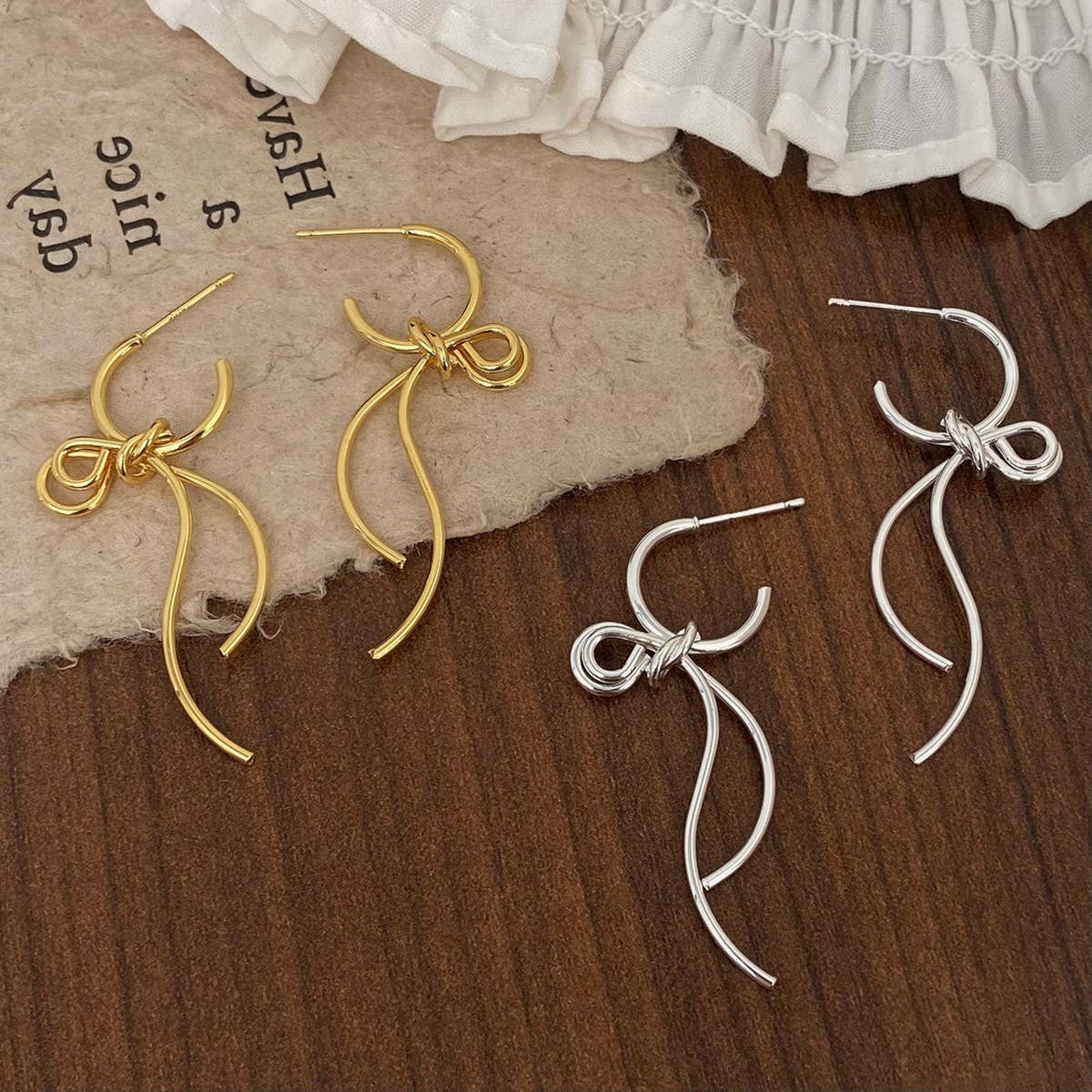 FASHIONABLE HIGH-GRADE METAL BOW PENDANT EARRINGS