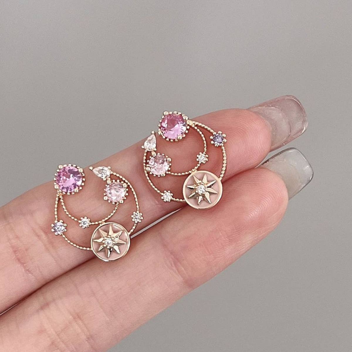 HOLLOW ZIRCON STAR EARRINGS