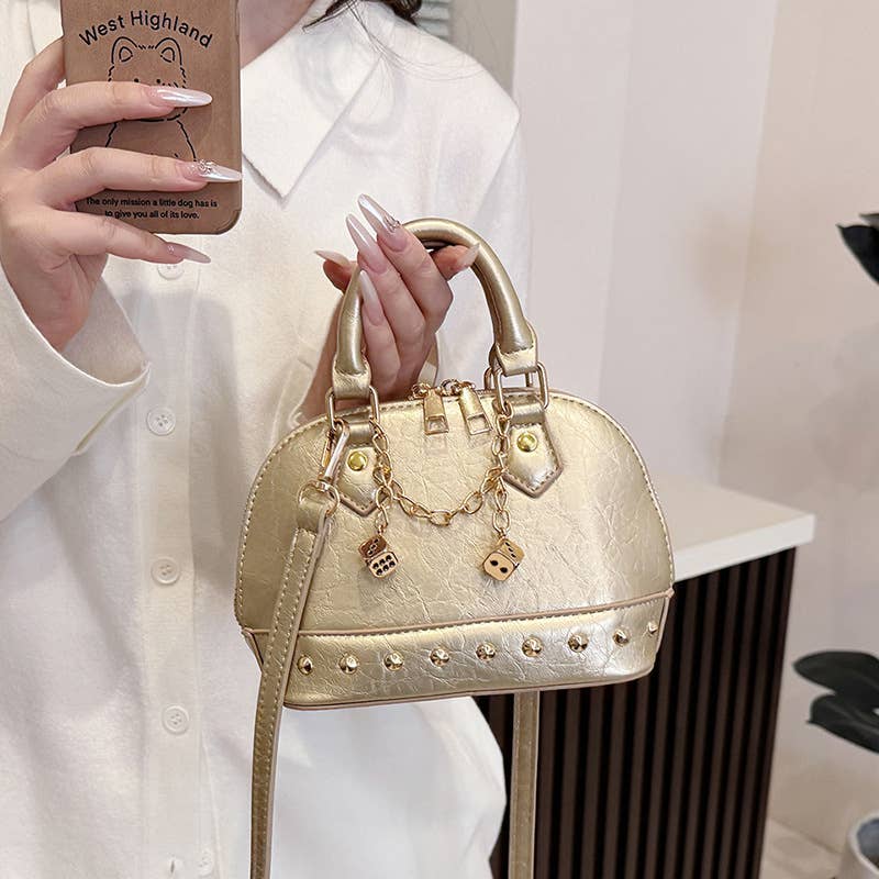 Fashionable riveted single-shoulder bag