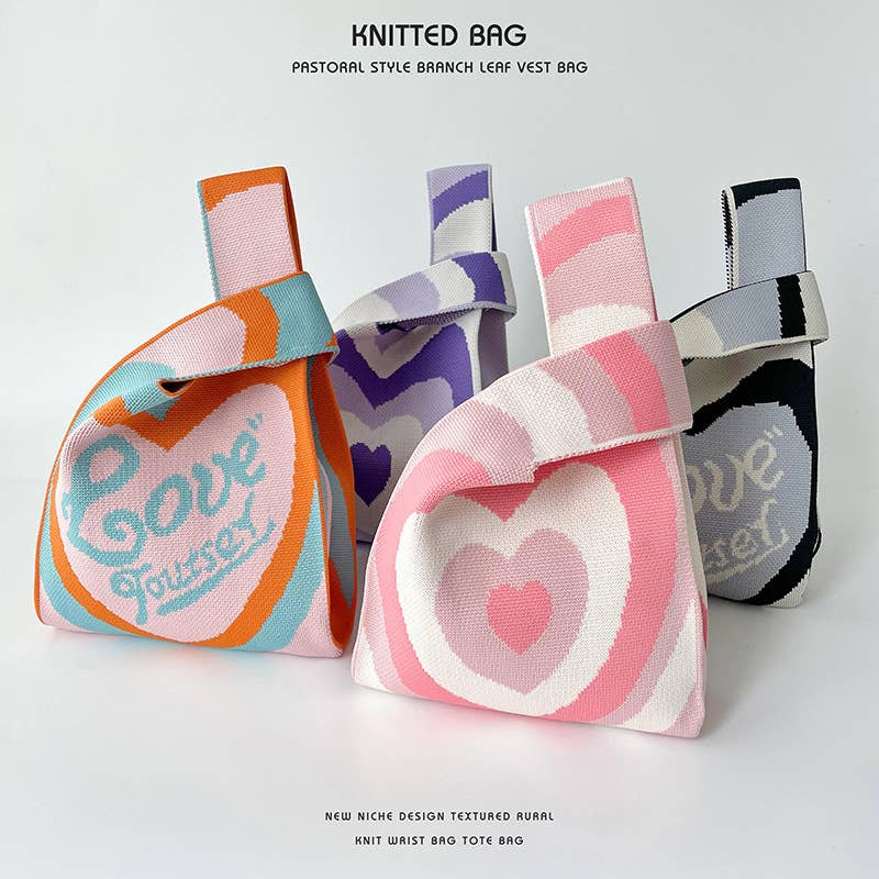 Heart-shaped color-blocked knitted handbag