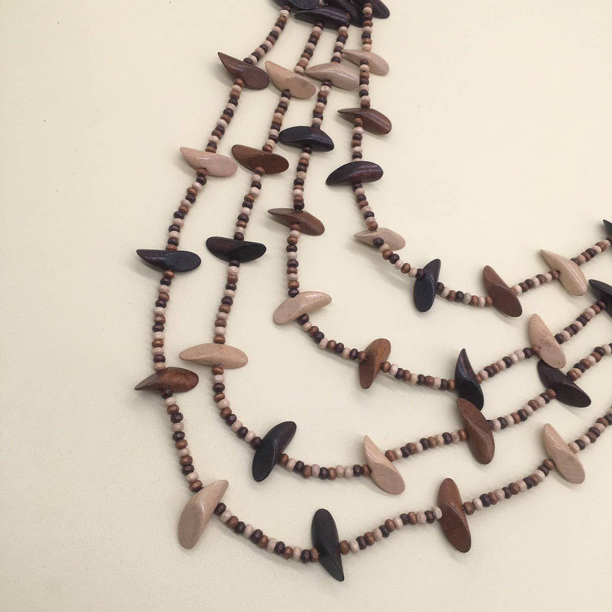 GEOMETRIC WOODEN BEADED LAYERED NECKLACE