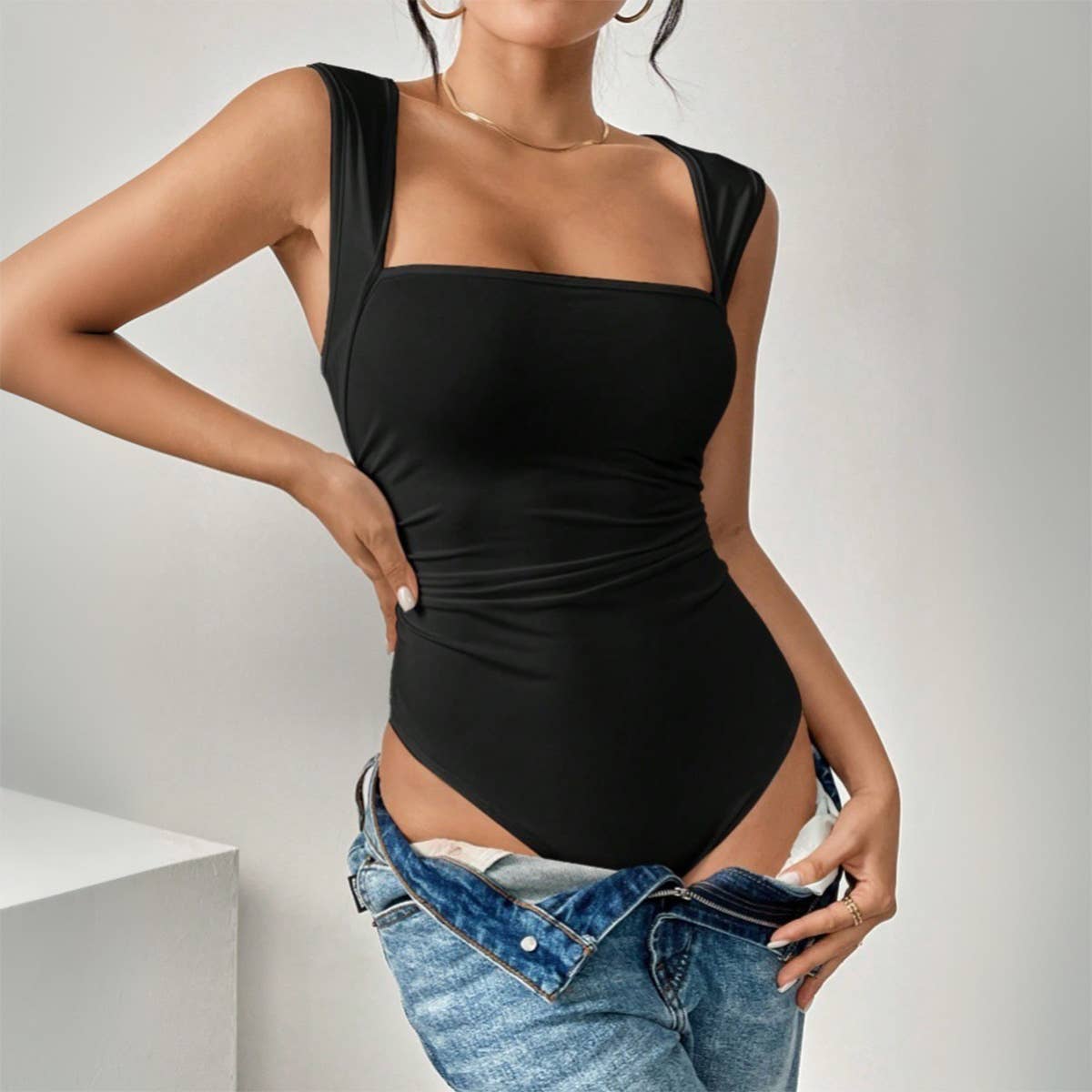 All commuter style three-point tapered onesie