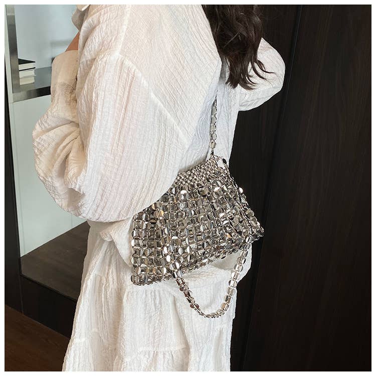 Fashionable hollowed-out glossy crossbody bag