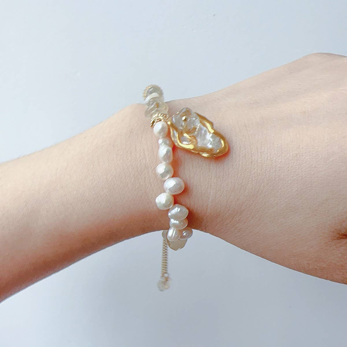 GLITTERING WAVE-SHAPED NATURAL PEARL SET