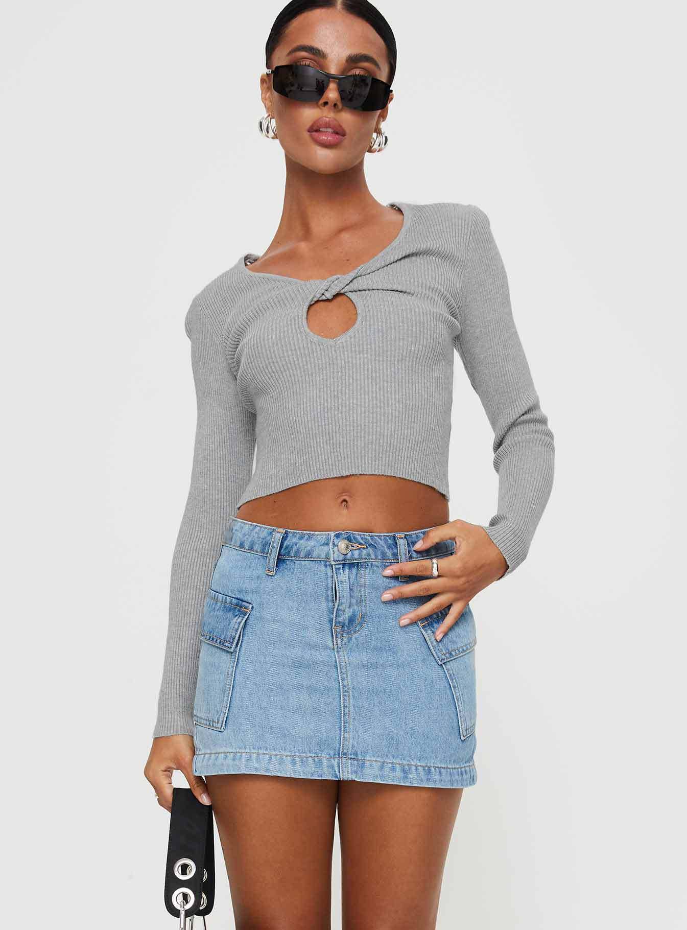 Washed denim mini skirt with elegant temperament