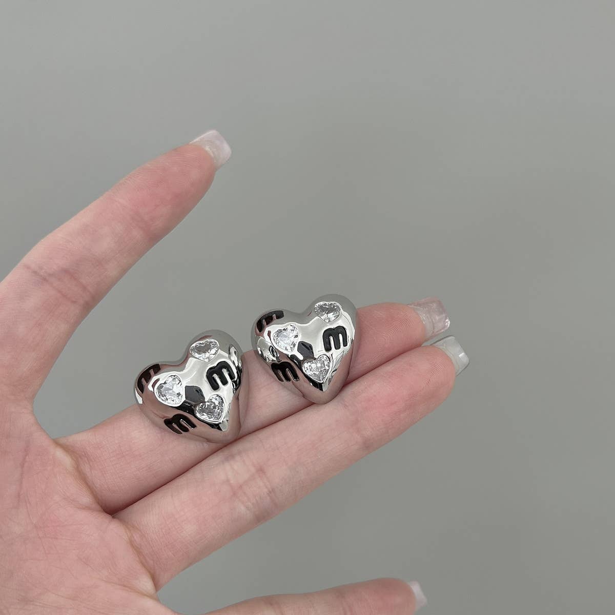 HALF FACE THREE-DIMENSIONAL EARRINGS