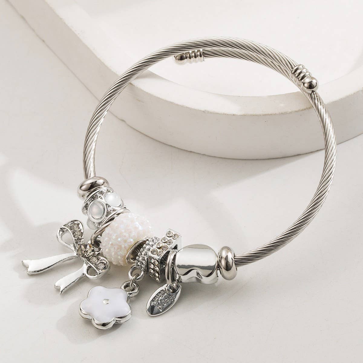 Silver Steel Bracelet with Bow & Flower Charms