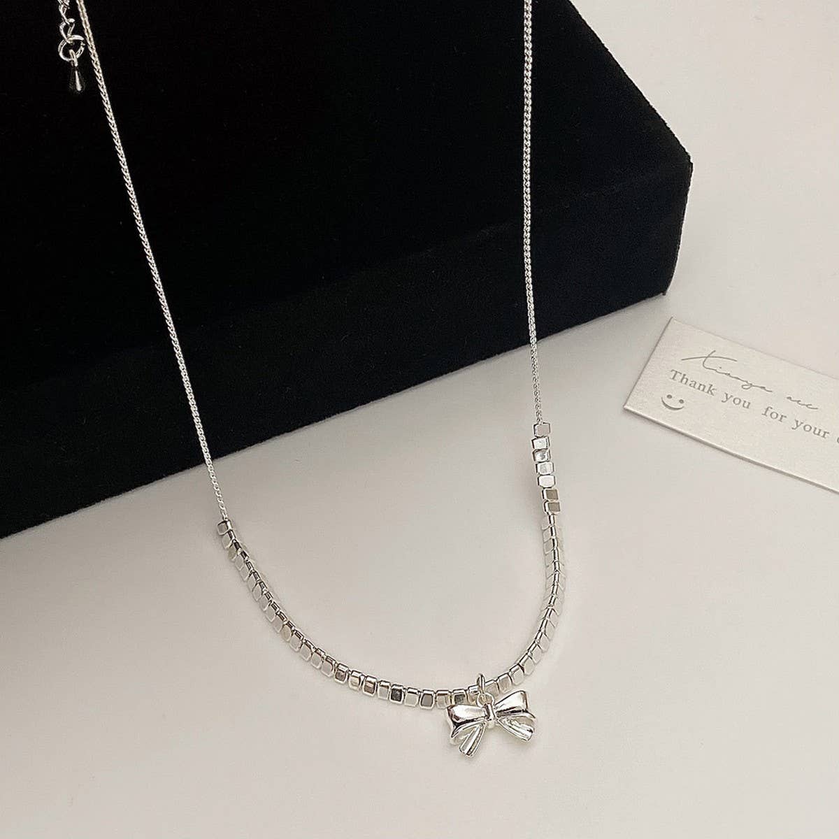 NEW HIGH-END VERSATILE BOW PENDANT NECKLACE