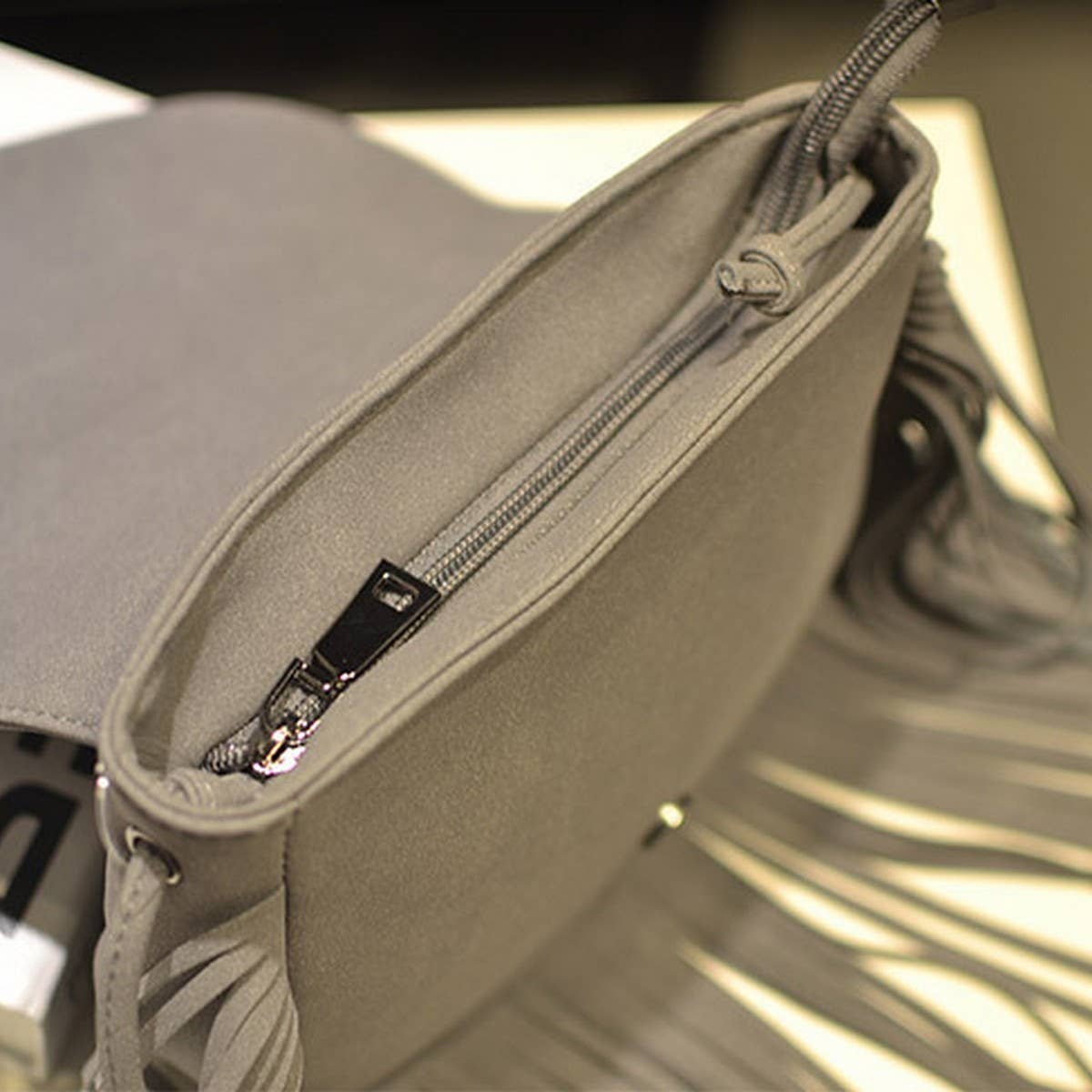 CWAB4563_BRAIDED BELT BUCKLE NUBUCK TASSEL SHOULDER BAG