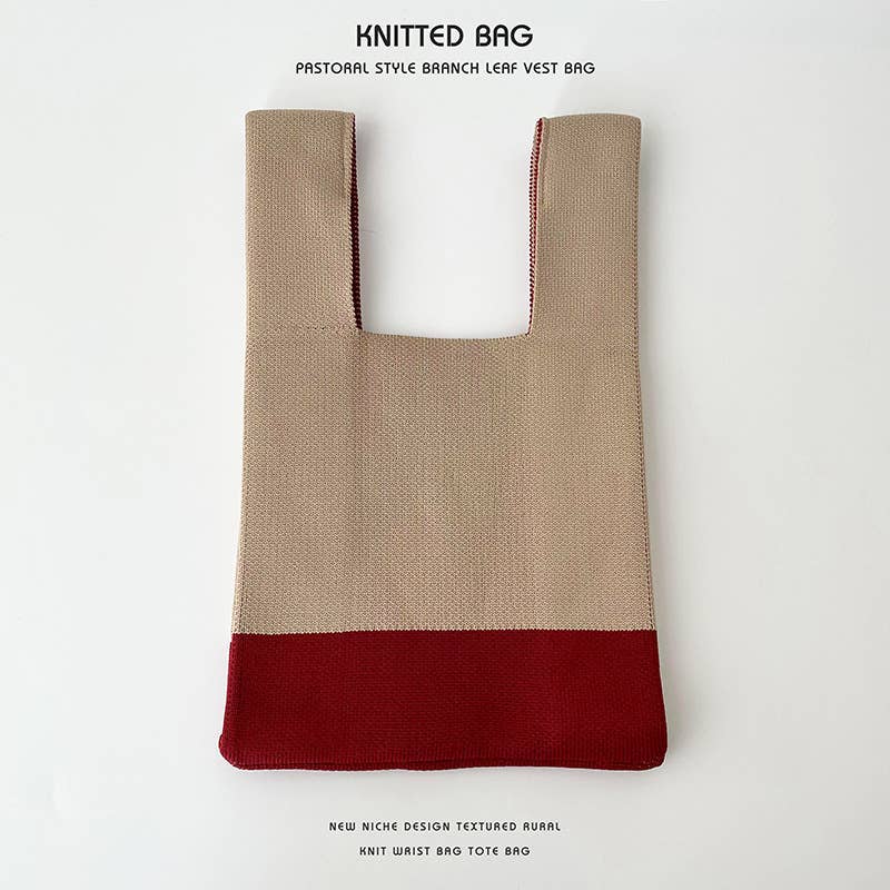 Heart-shaped color-blocked knitted handbag