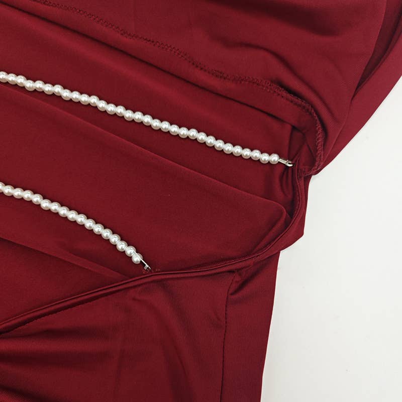 A cinched-neck backless and collared dress