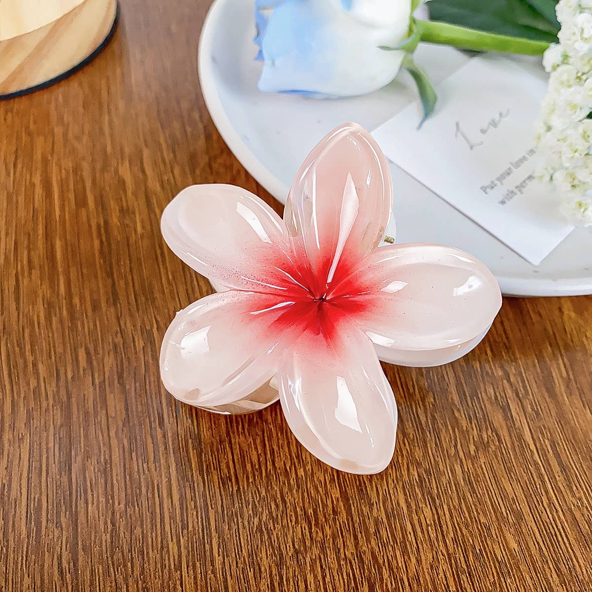 Frangipani hand-held vintage flower hair clips