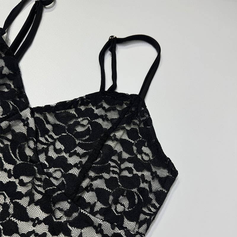 A strappy deep V lace see-through dress