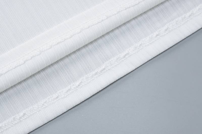 A backless cutout halter dress with a slim fit