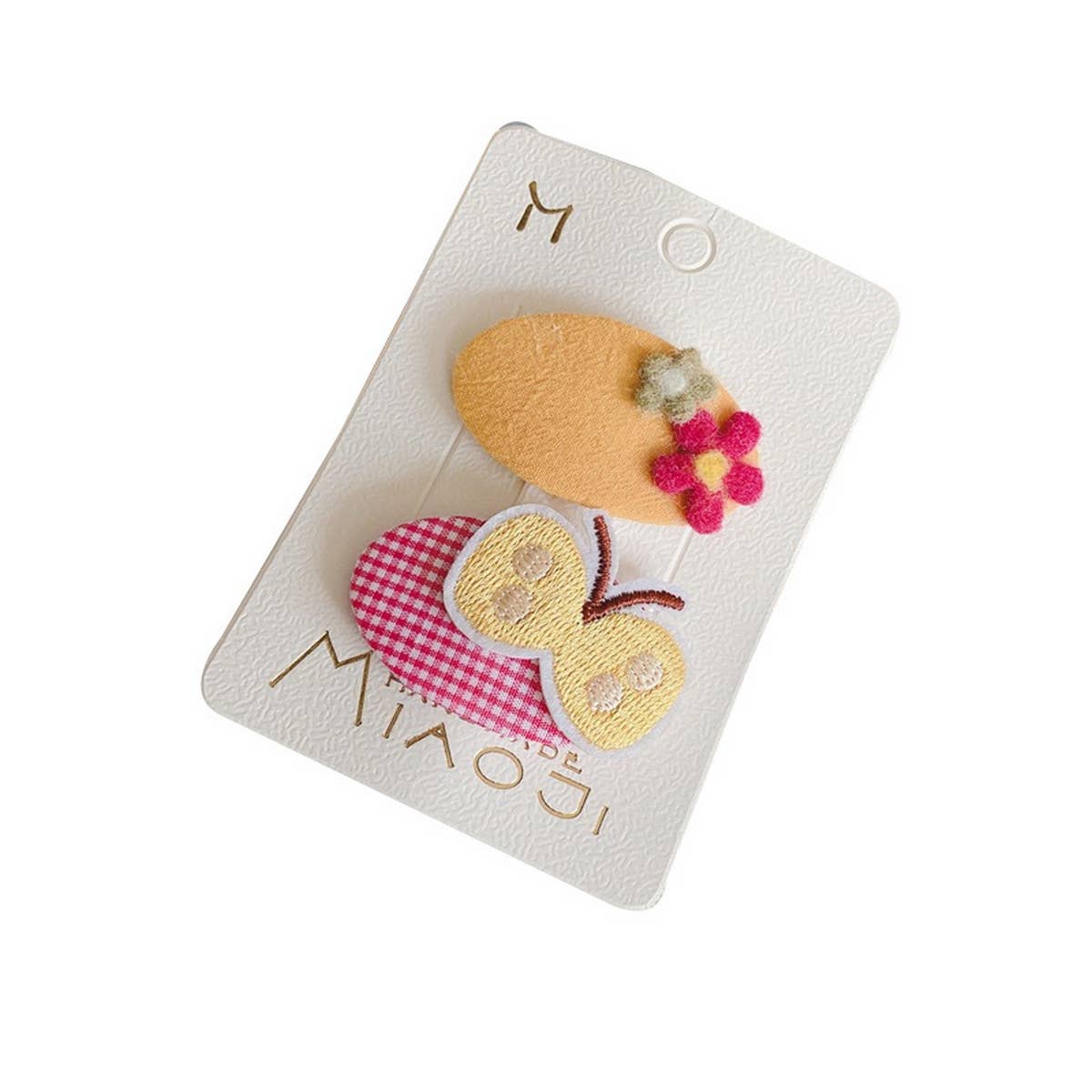 CHILDREN'S OVAL EMBROIDERED PATCH HAIRPIN