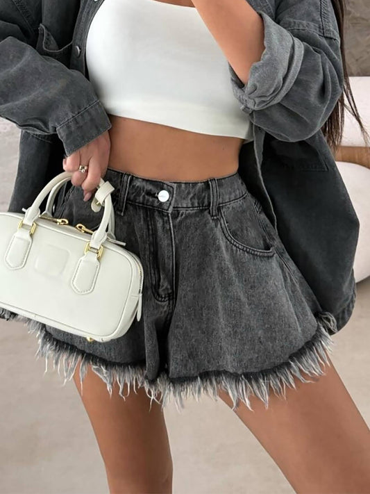 High-waisted umbrelle-shaped black denim shorts