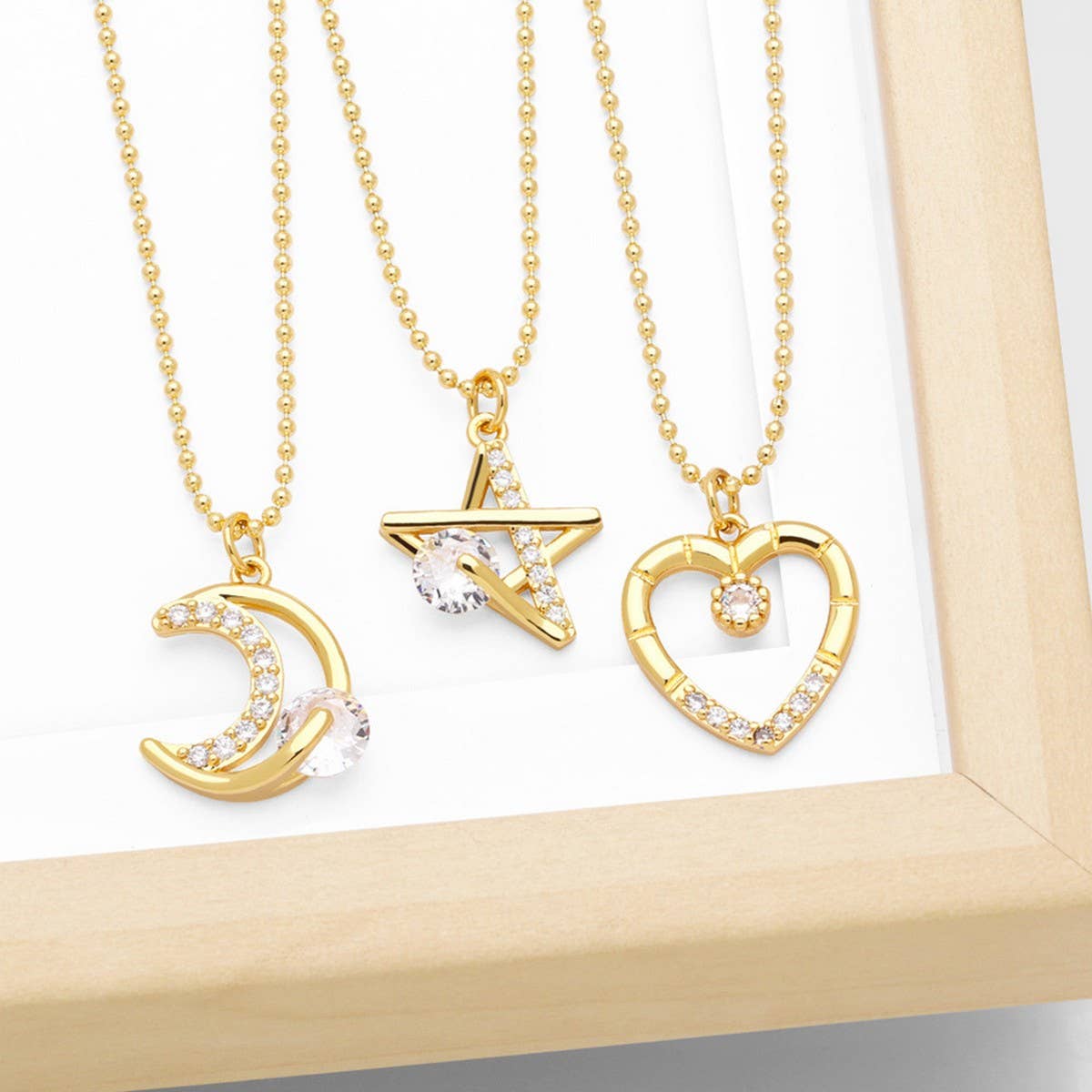MOON STAR HEART PENDANT NECKLACE