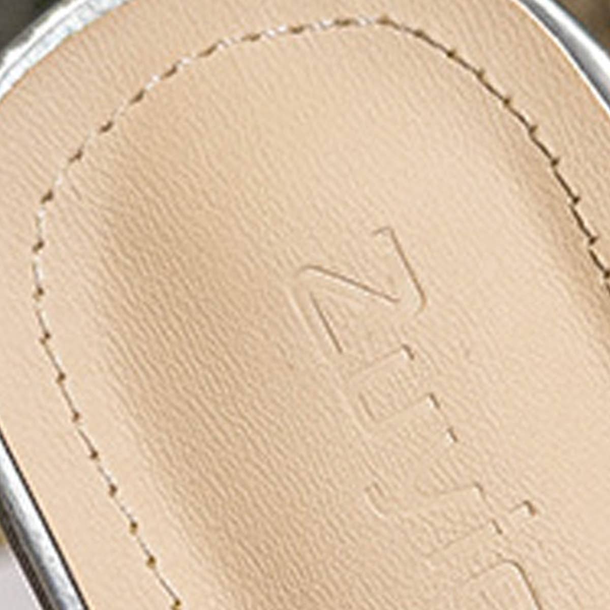 WEARING RHINESTONE STRAPPY HIGH HEELS