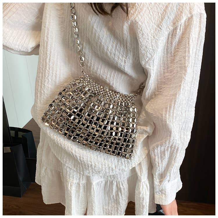 Fashionable hollowed-out glossy crossbody bag