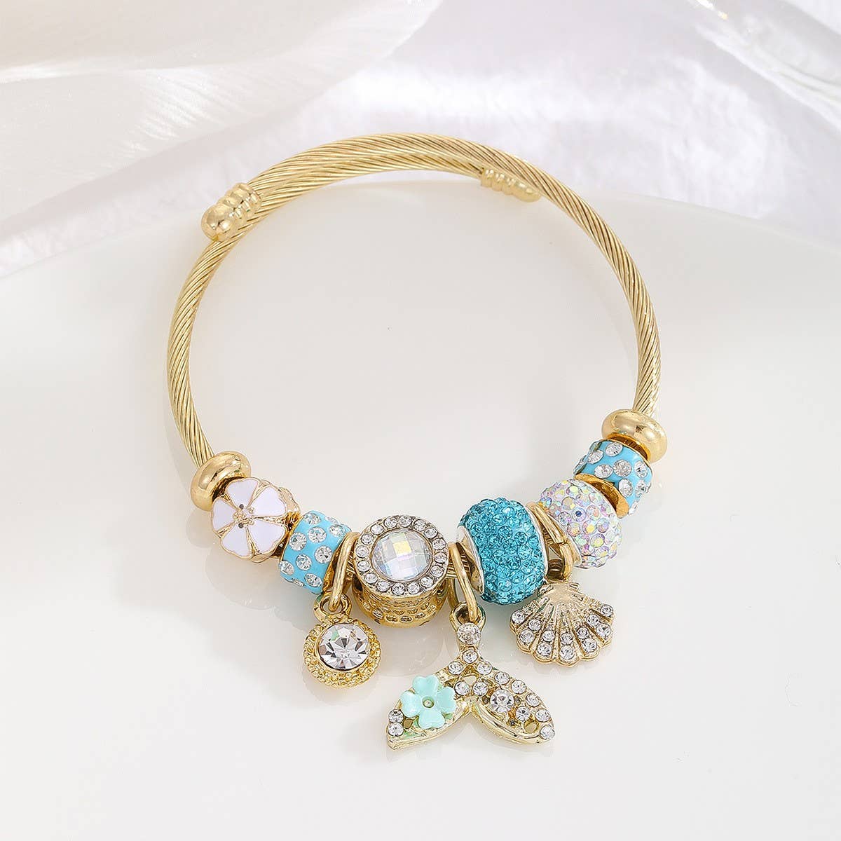 Gold Bracelet with Tree, Heart & Tail Charms