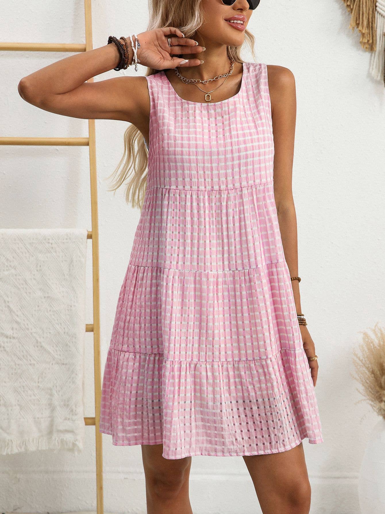 Loose, casual and flowing sleeveless plaid dress