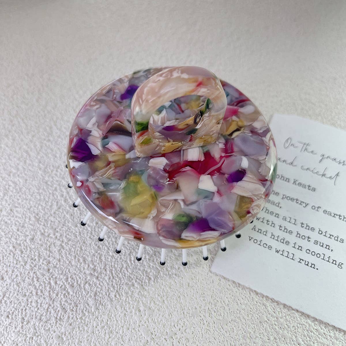 SIMPLE AND PORTABLE MASSAGE COMB