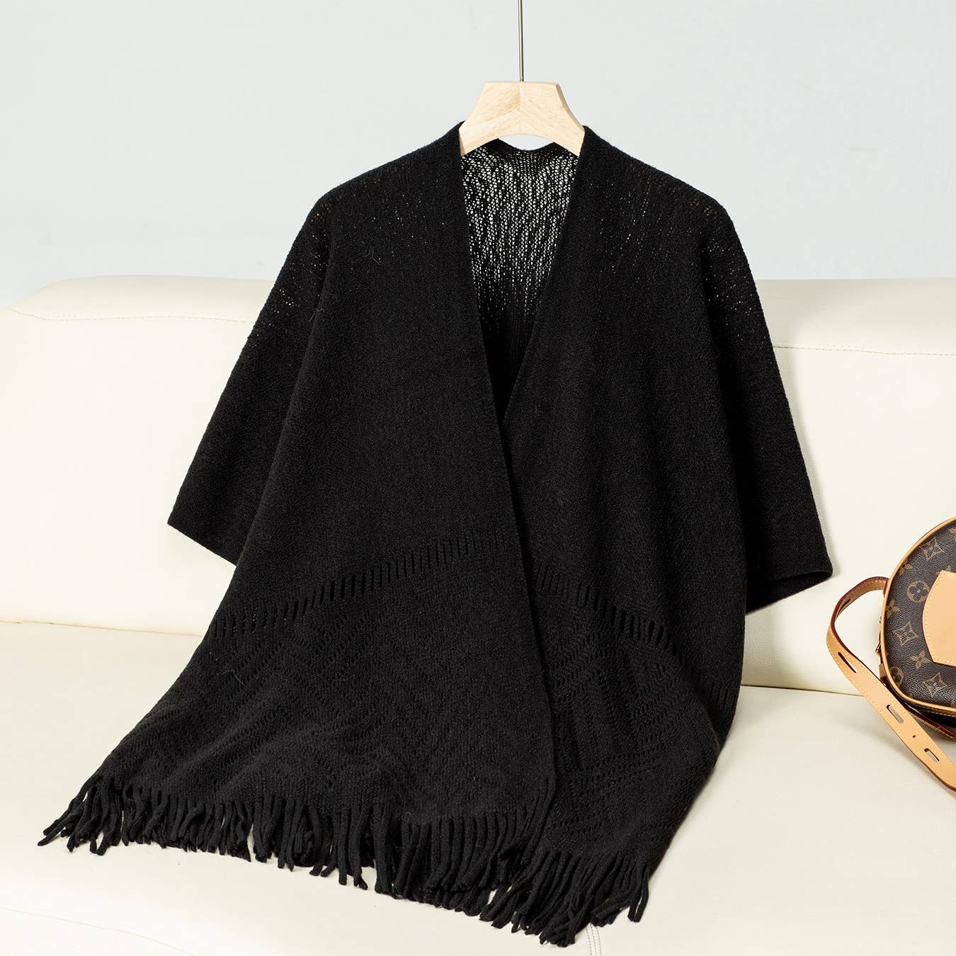 Solid colour hollow knit tassel cape cape