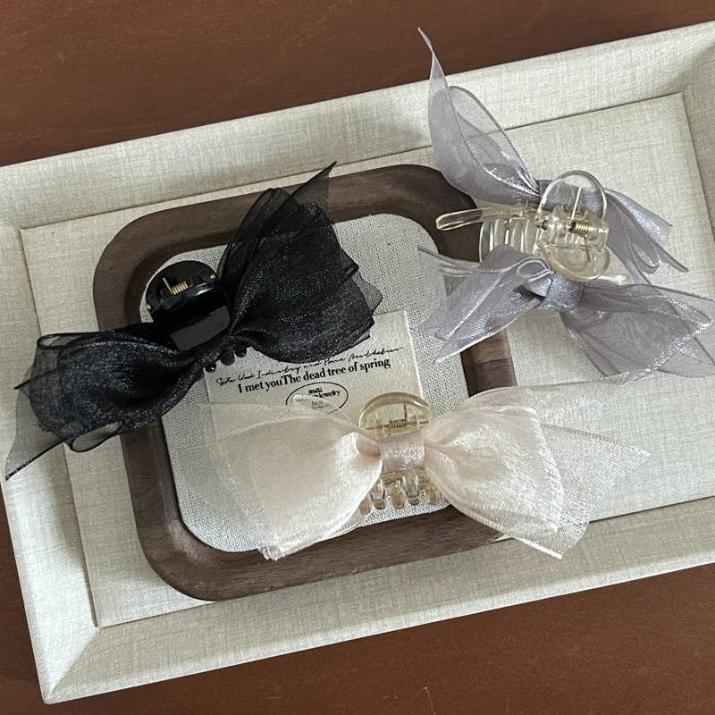 Fashionable and design-oriented mesh bow clipper