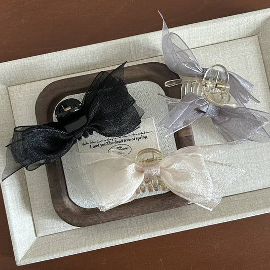 Fashionable and design-oriented mesh bow clipper