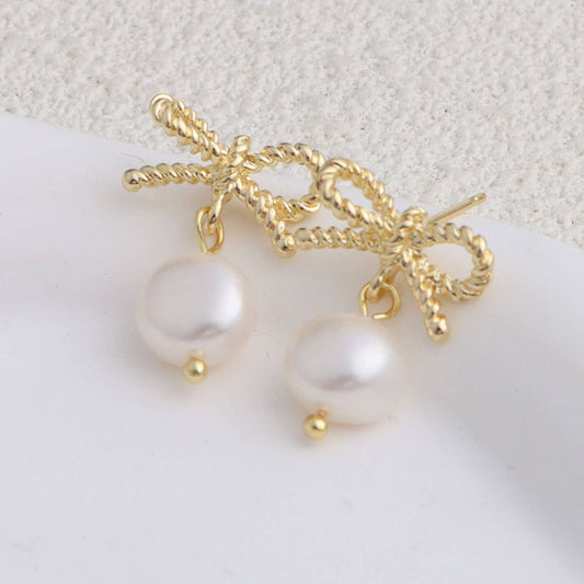 Trendy metal bow freshwater pearl earrings