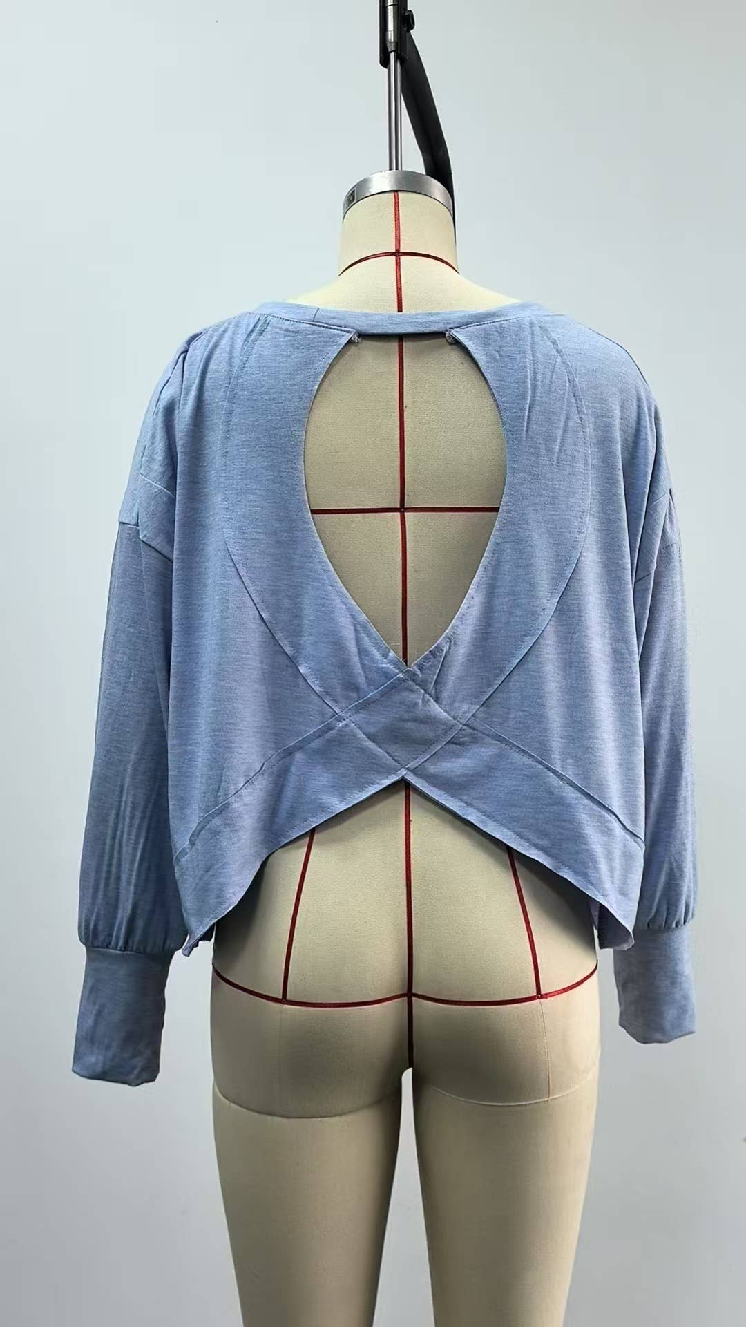 Long sleeve solid color loose back cut-out top