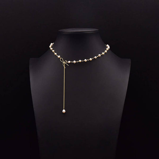 SIMPLE AND ELEGANT HIGH-END BOW PEARL NECKLACE