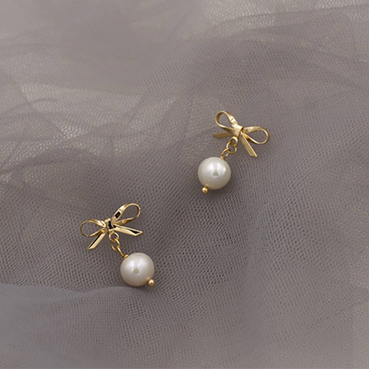 FASHIONABLE AND VERSATILE BOW PEARL EARRINGS_CWAJE1681