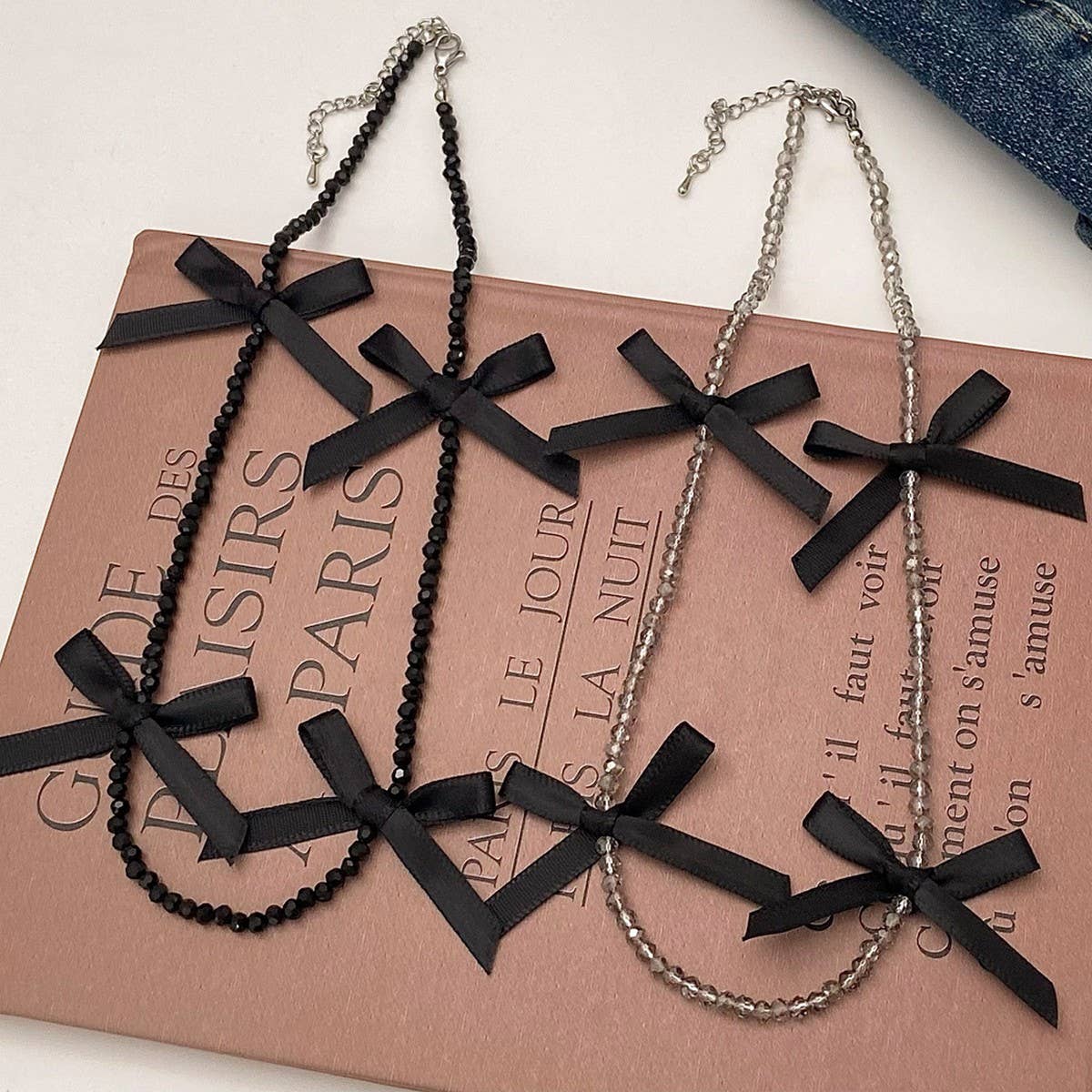 HAND-WOVEN BLACK CRYSTAL BEADED BOW NECKLACE
