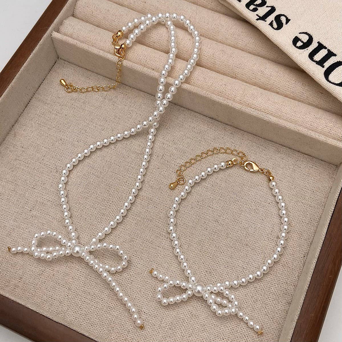 NEW SWEET RETRO BOW PEARL NECKLACE BRACELET SET_CWAJE3071