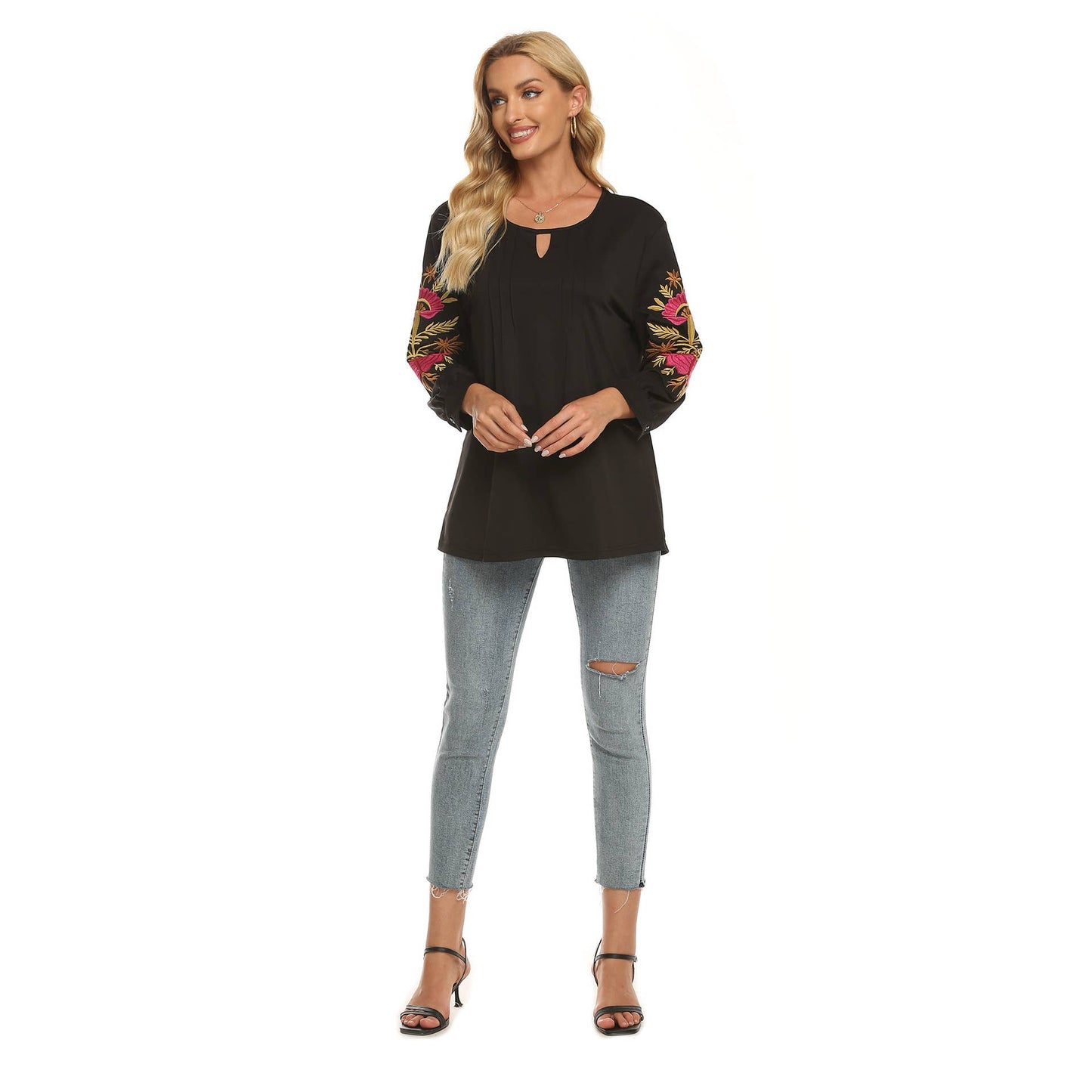 Three-dimensional flower-embroidered top