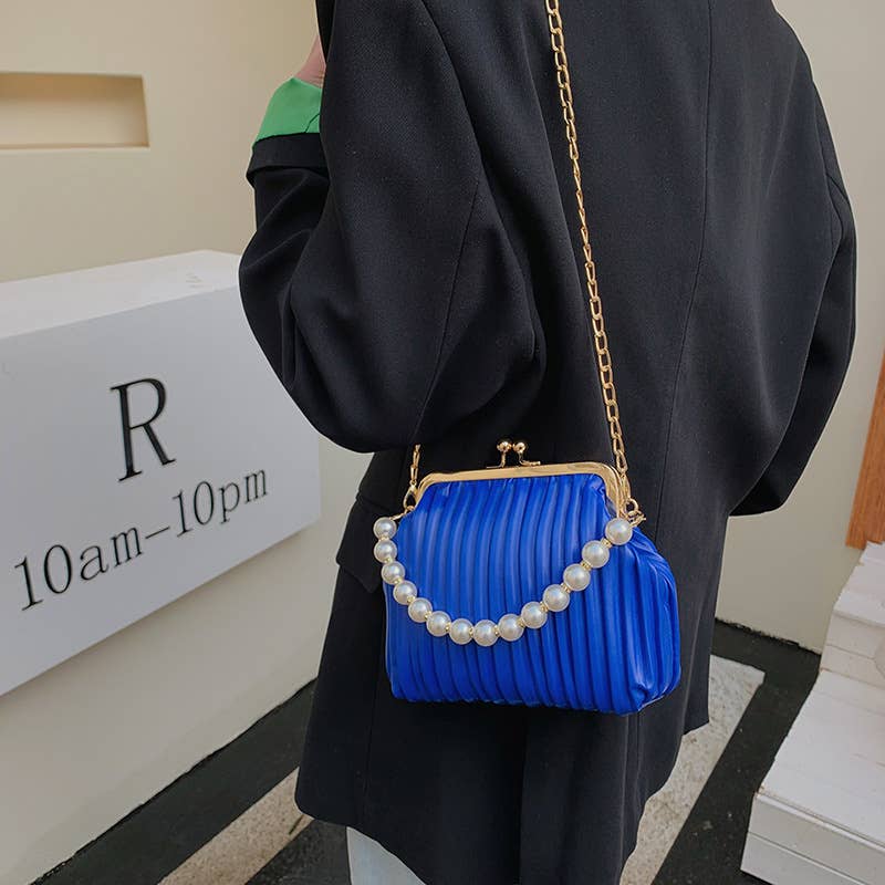 Pearl shell bag diagonally across the body