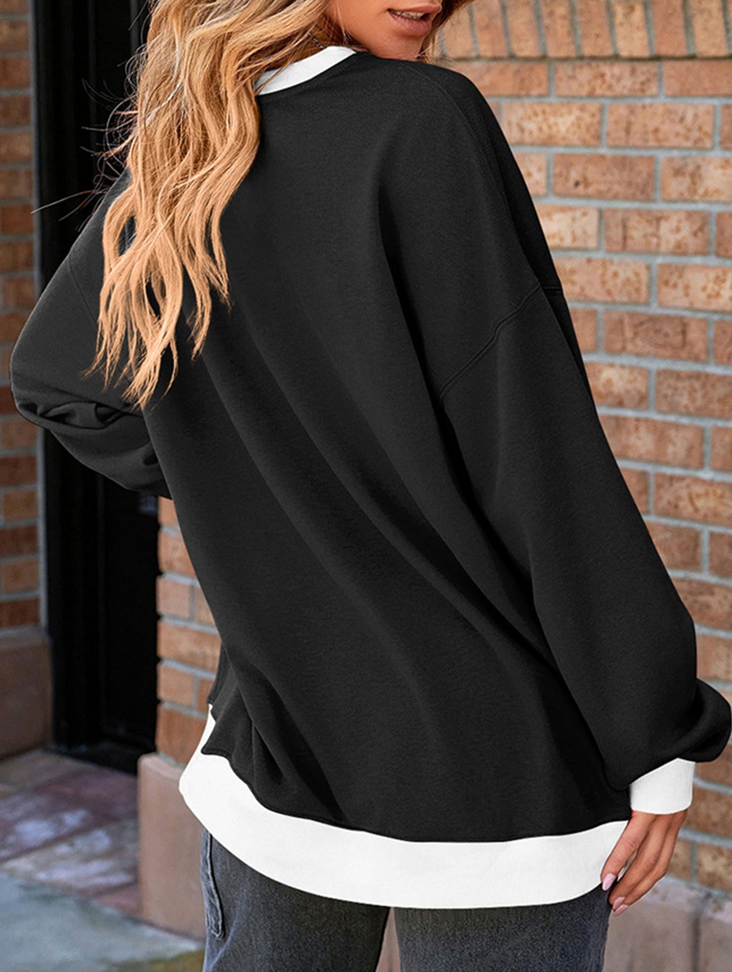 Contrast color splicing round neck sweater