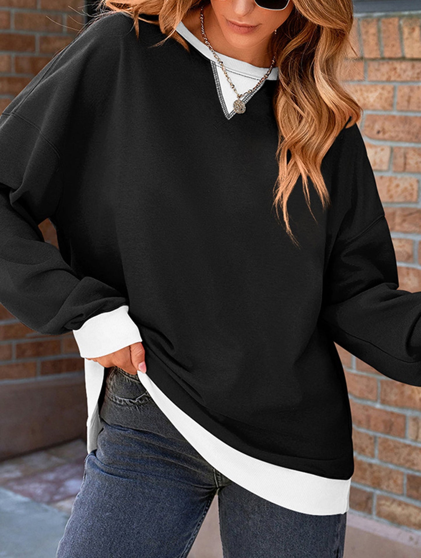 Contrast color splicing round neck sweater