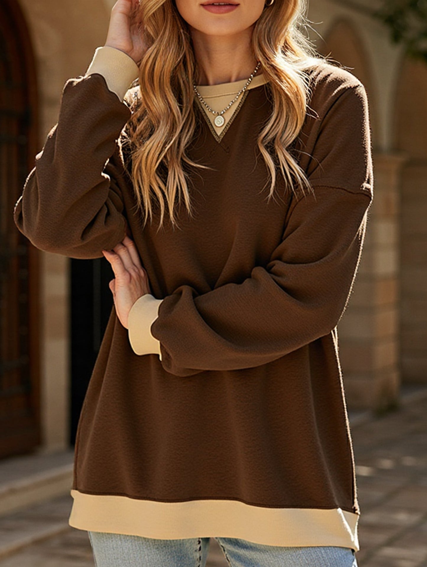 Contrast color splicing round neck sweater